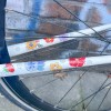 HUGS & STICKERS: Postkarte mit reflektierenden Fahrrad-Aufkleber Trockenblumen | MOOXIBIKE