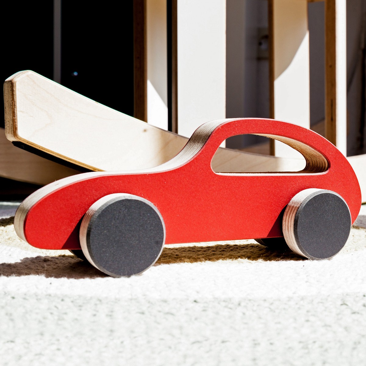 STADIG.brumm Spielzeugauto Flitzer aus Holz und Linoleum