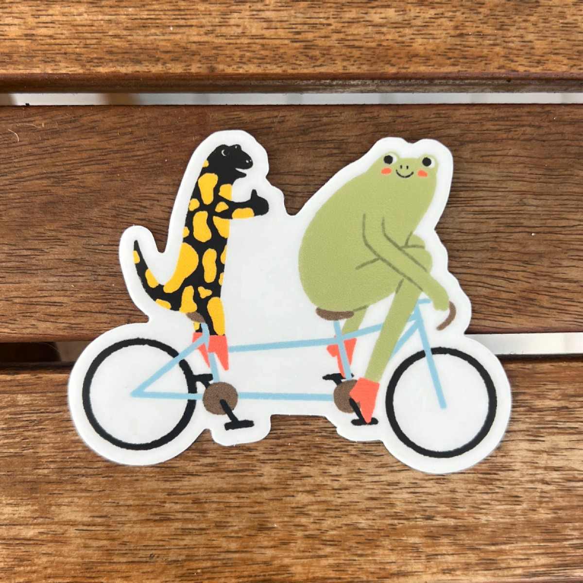 The Naughty District - Sticker »Frosch und Salamander auf Tandemfahrt«