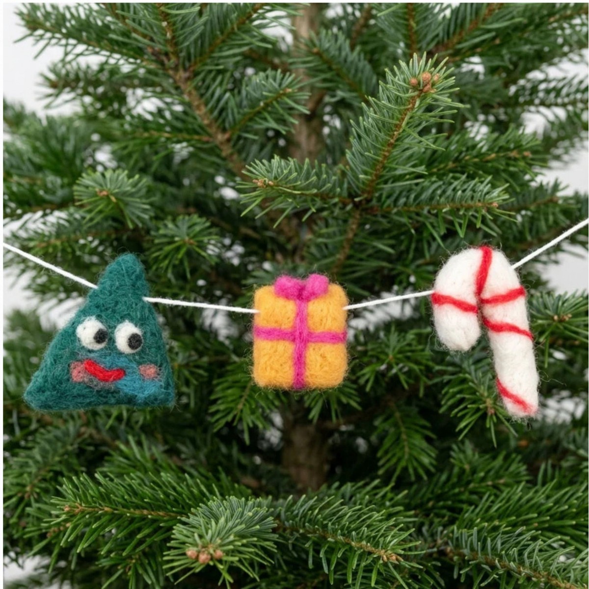 Zuckerstange-Geschenk-Tanne-Girlande-Weihnachtsdeko-aus Filz – Ettmoln