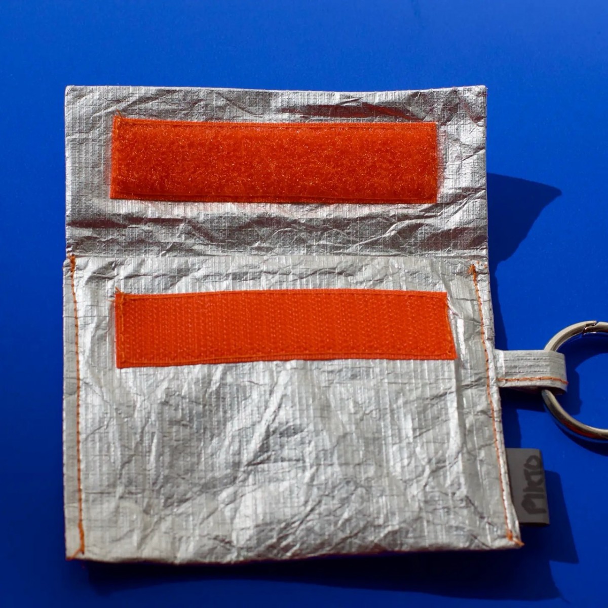 Pikto3000 Mini-Portemonnaie – Silber mit Orange – Superleichtes Tyvek®-Wallet