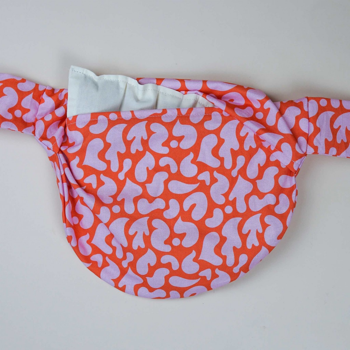 Wärmekissen mit Bindeband & Dinkel gefüllt "Orange-Pink"