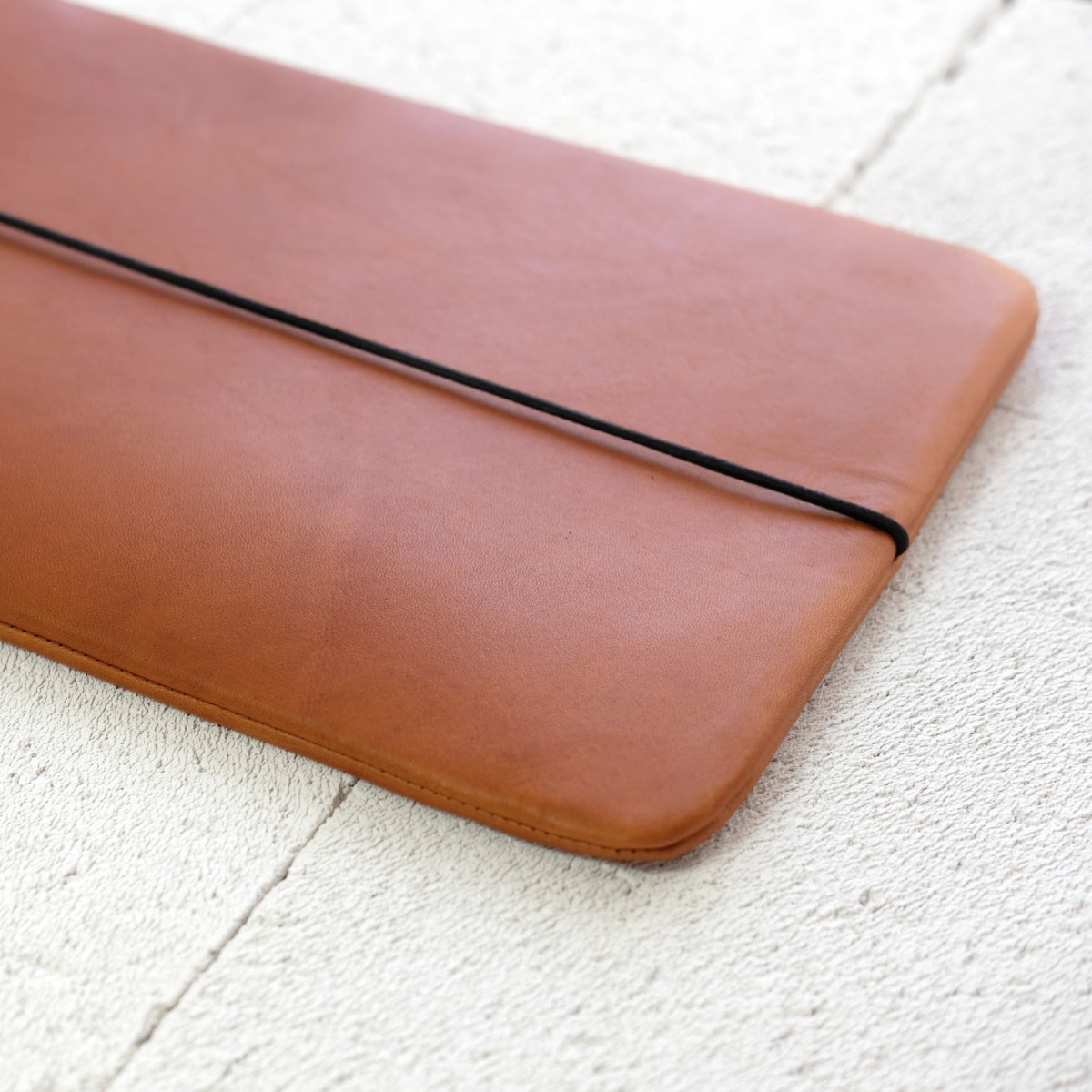 MacBook Sleeve aus braunem Leder