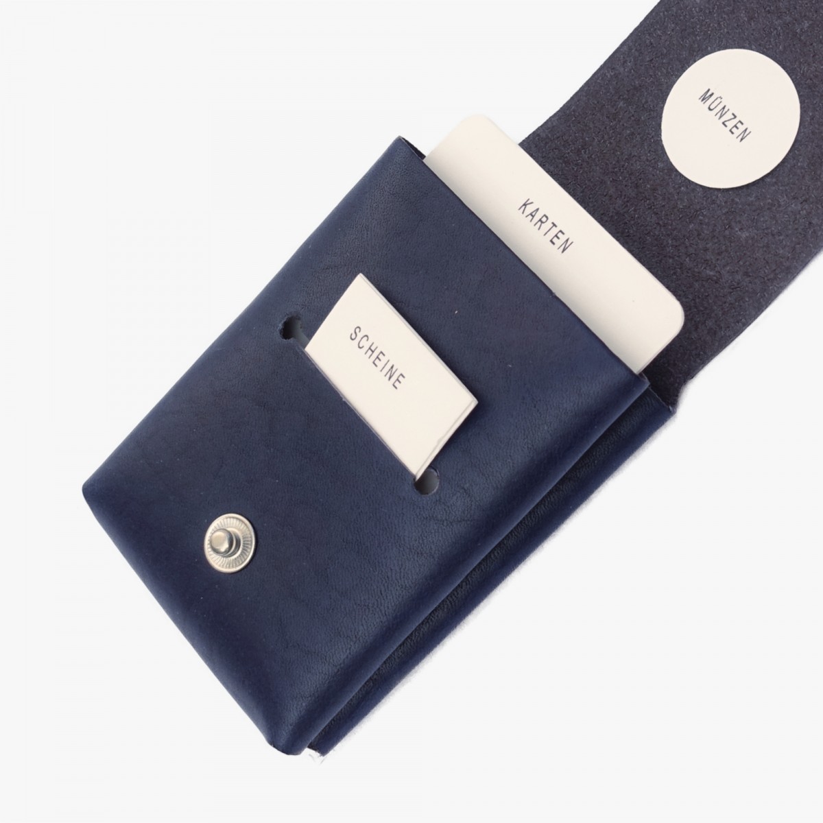 EINFACHDESIGN, Slimwallet, Minigeldbeutel dunkelblau aus pflanzlich gegerbtem Leder
