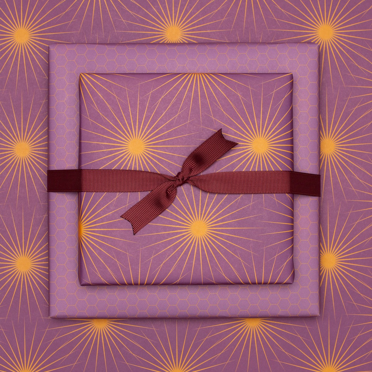 Lila Geschenkpapier "Sonnensterne" - 5 Bogen