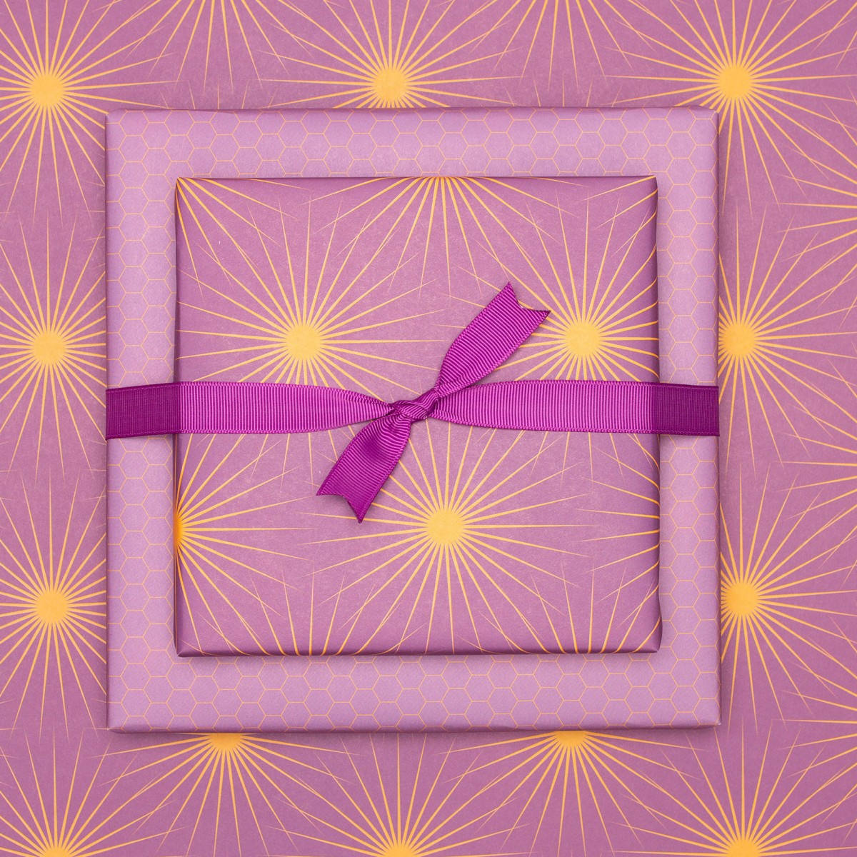 Lila Geschenkpapier "Sonnensterne" - 5 Bogen