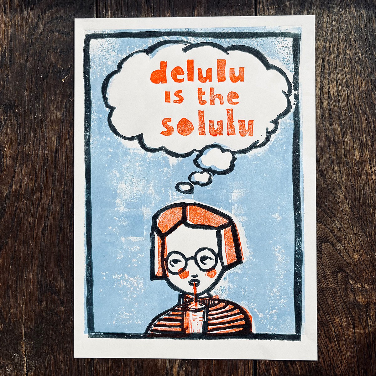 delulu
is the
solulu
Linoldruck von papelami