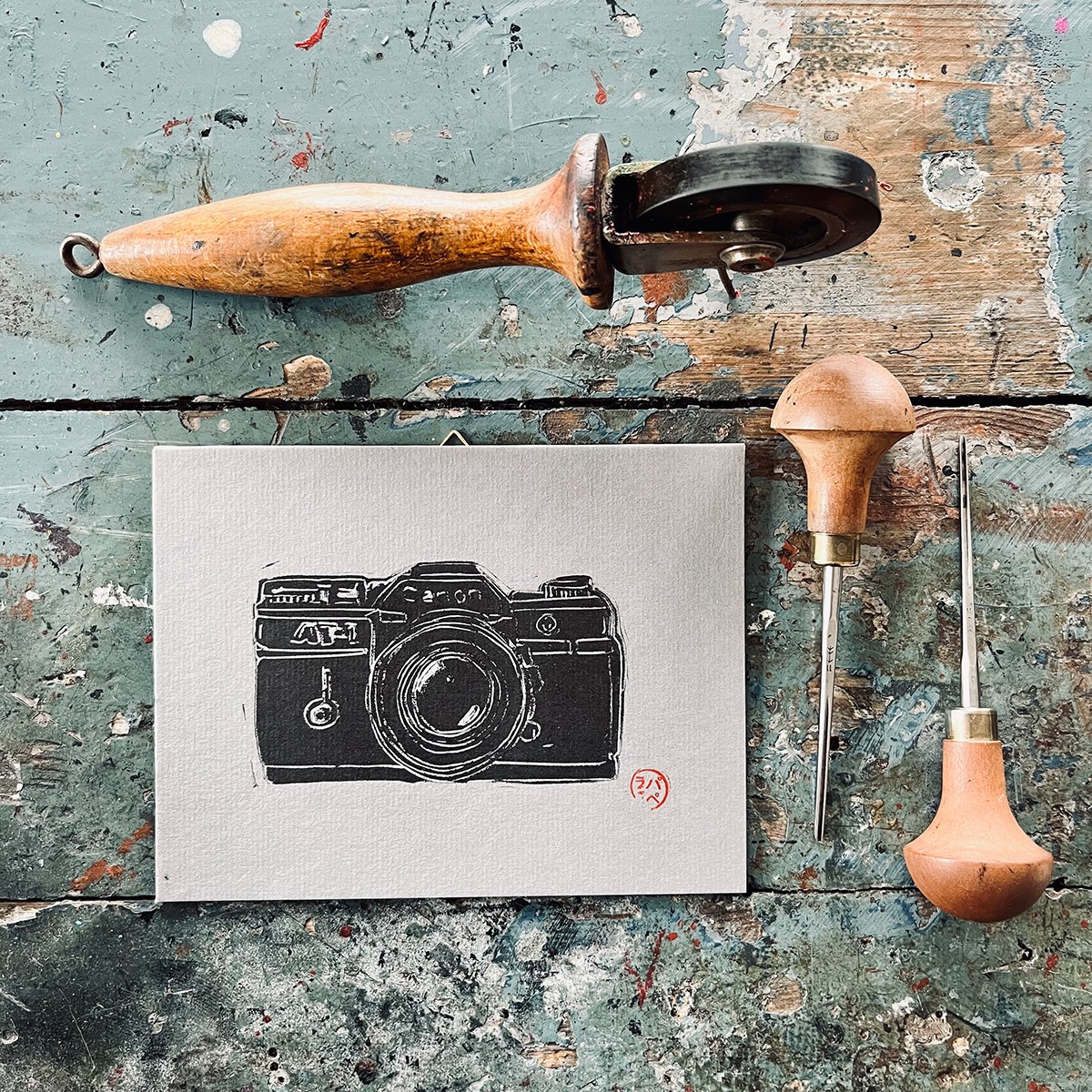 Fotoapparat – Kamera – canon 
Linoldruck von papelami