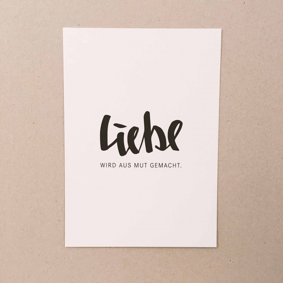 Love is the new black - Postkarte "Liebe wird aus Mut gemacht"