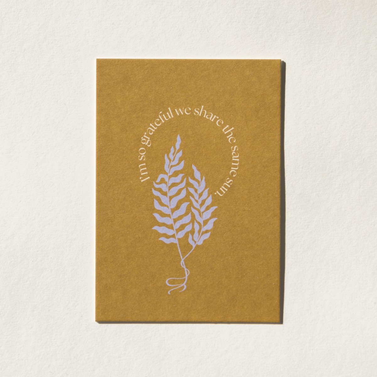 "I'm so grateful we share the same sun" Postkarte mit Briefumschlag von REYOUNITE