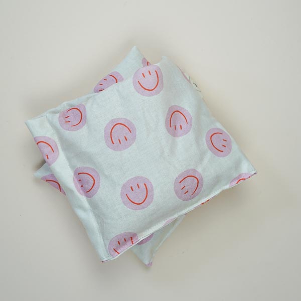 Dinkel Wärmekissen "Smiley Pink" – Körnerkissen zum Erhitzen aus Baumwolle und Bio-Dinkel - Tochter von Walter