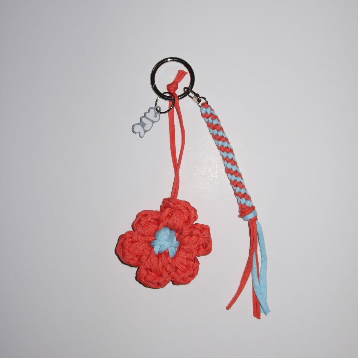 ARC BAG CHARM CORAL