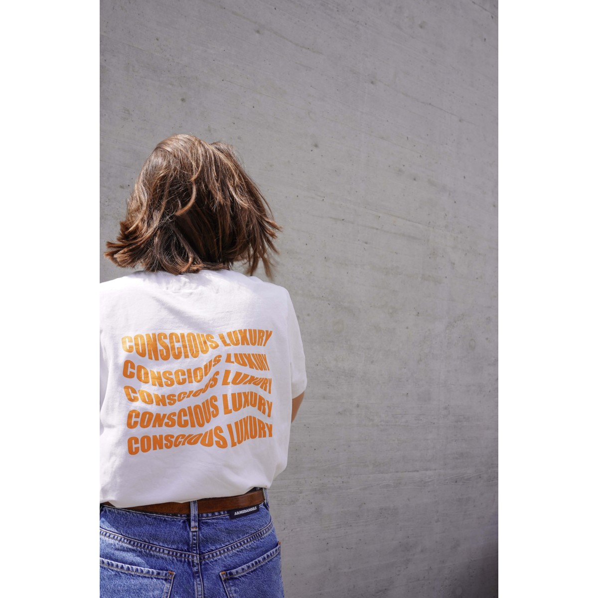 Nachhaltiges Unisex T-Shirt 'Conscious Luxury ' mit Print
