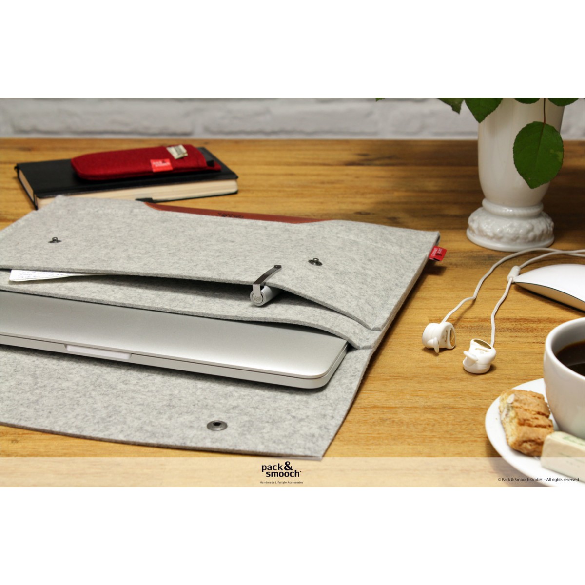 Pack & Smooch - MacBook Sleeve "Hampshire"
100% Merino Wollfilz, rein pflanzlich gegerbtes Leder
