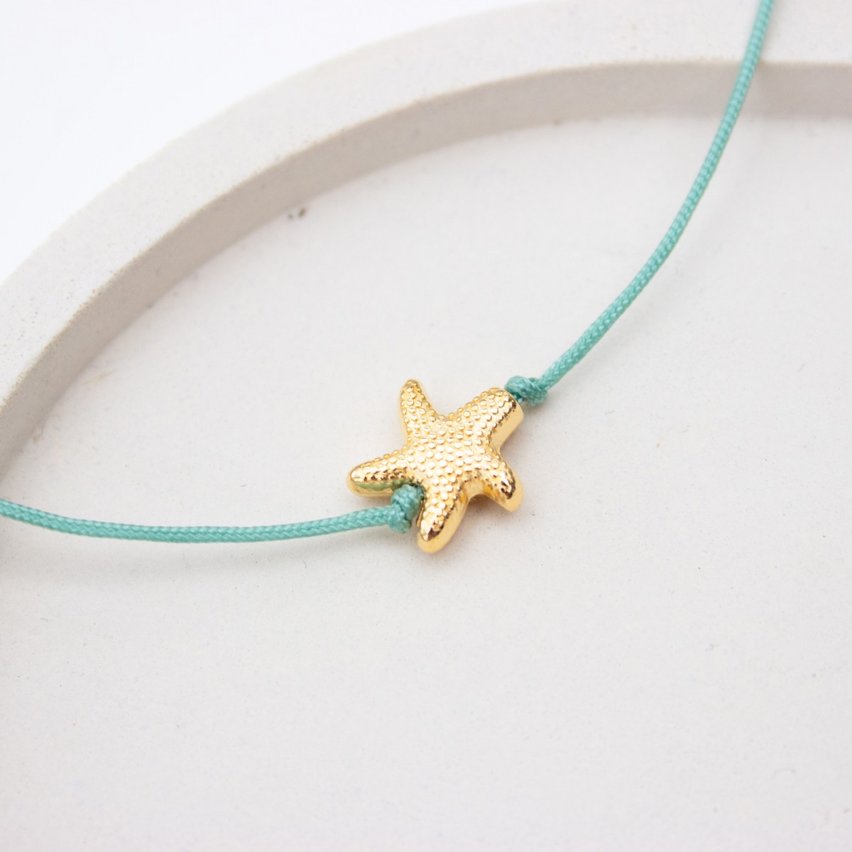 Bow & Hummingbird Armband auf Karte - Seesternchen - Meeresrauschen - 24 Karat vergoldet