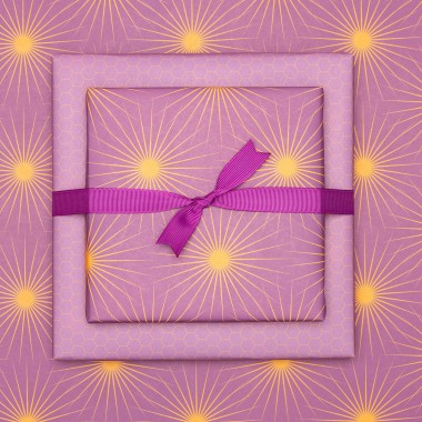 Lila Geschenkpapier "Sonnensterne" - 5 Bogen