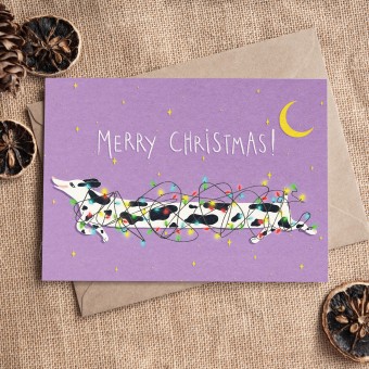 The Naughty District - Weihnachtskarte »Weihnachtsdackel mit Lichterchaos«