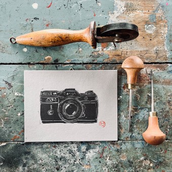 Fotoapparat – Kamera – canon 
Linoldruck von papelami